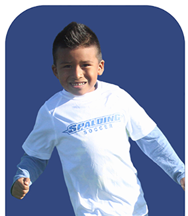 Boy with white jersey playing soccer
