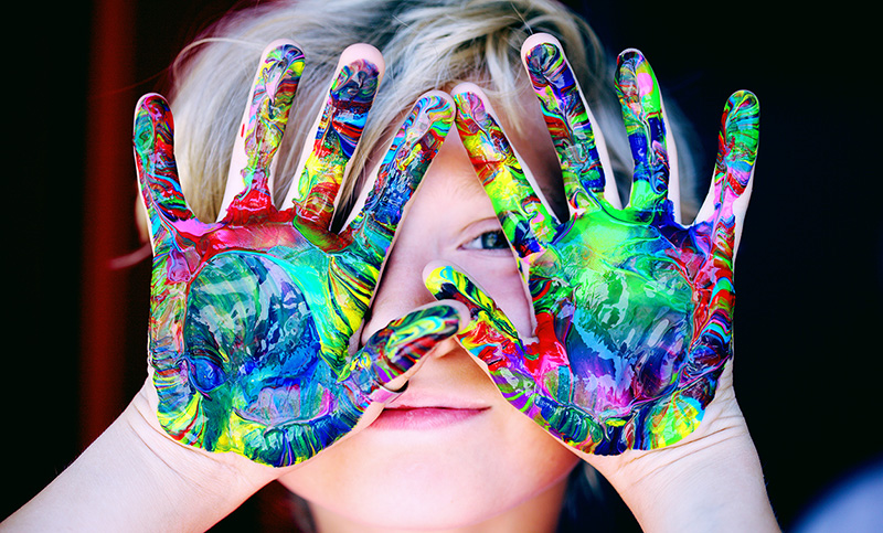 Little girl - Colorful hands